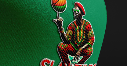 Close-up of the General Ayodele Snapback embroidery, showcasing a detailed figure in traditional attire spinning a basketball with precision stitching.